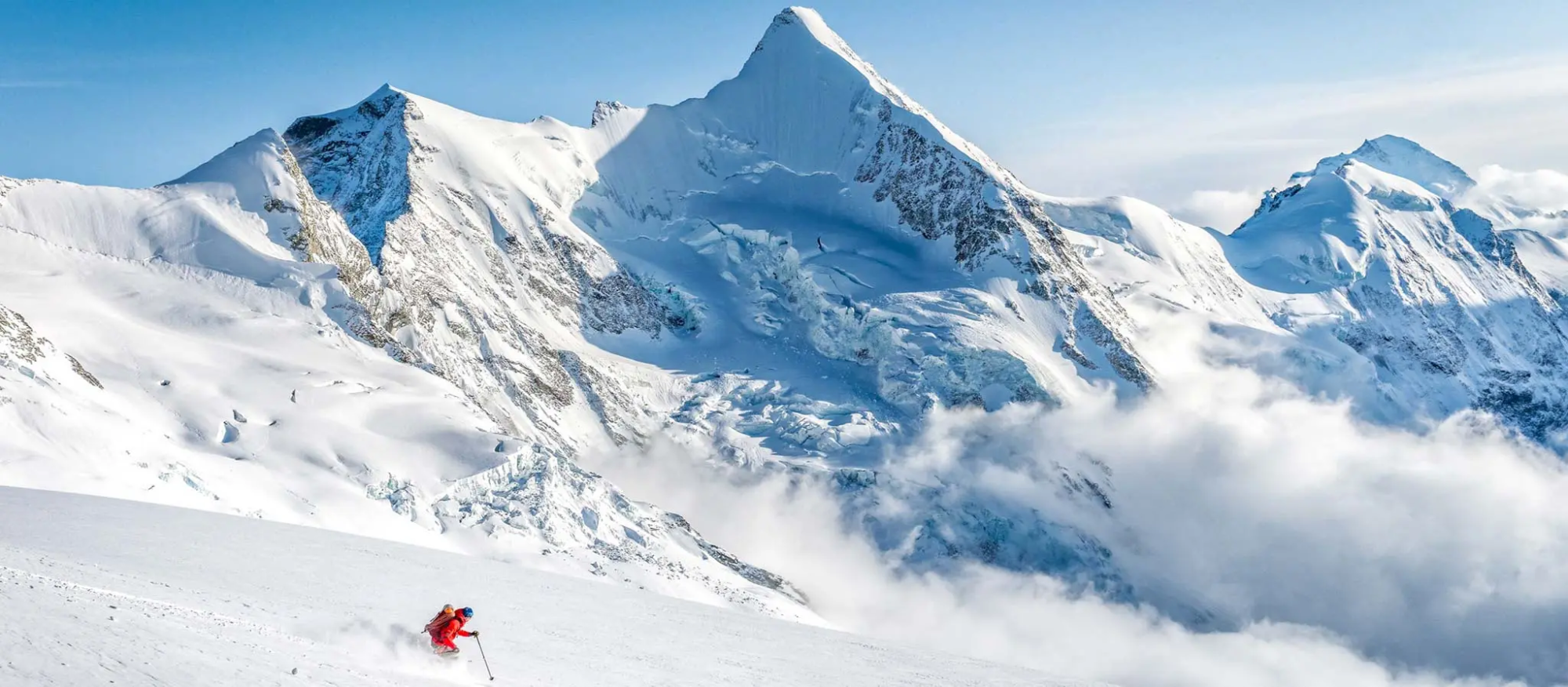 heliski-finhaut-poudreuse-skieur-montagne-hauteur